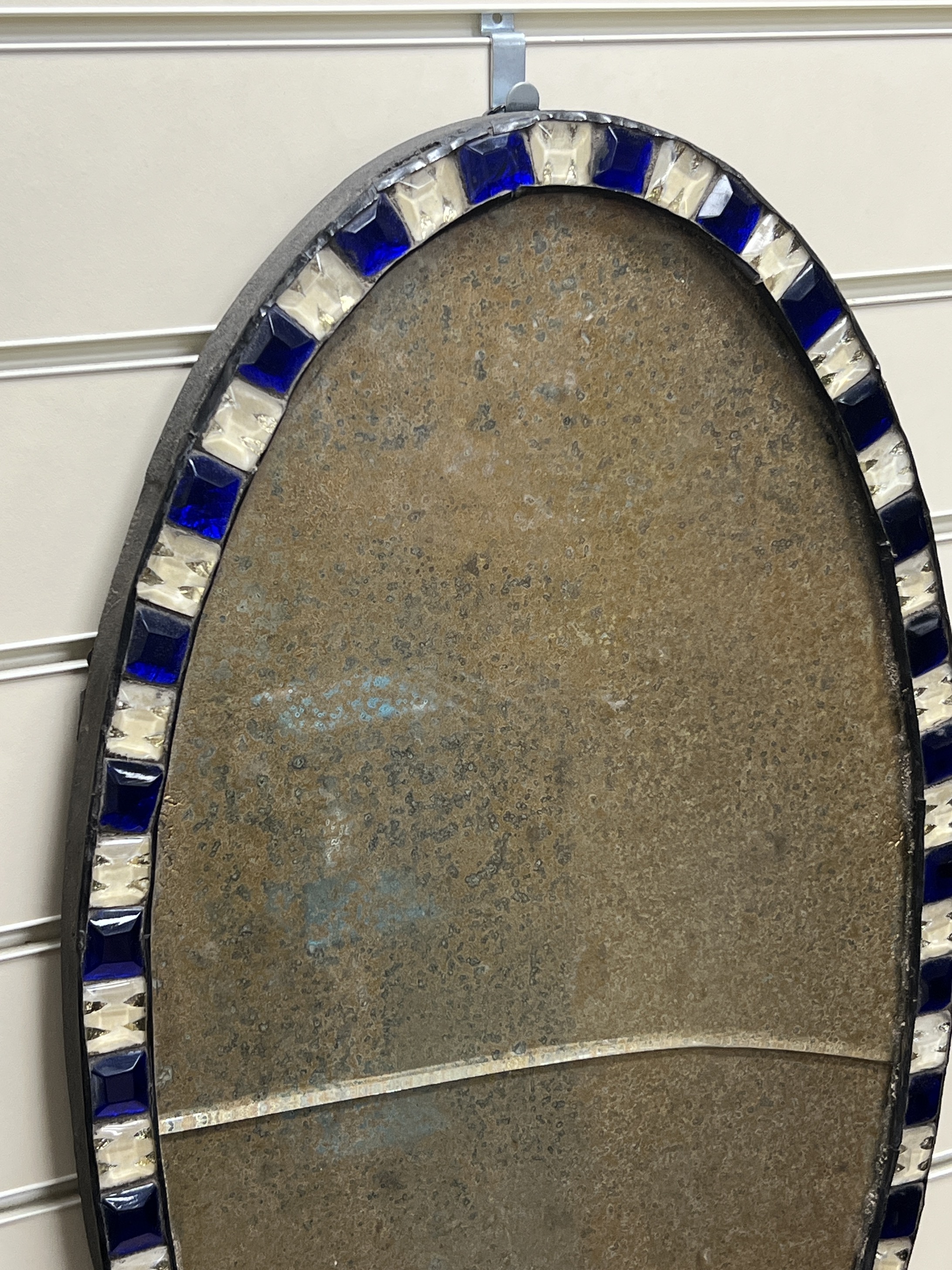 An Irish style oval wall mirror, width 38cm, height 66cm